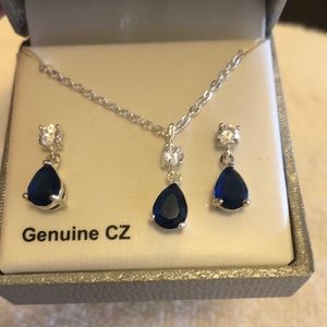 Genuine CZ necklace and earrings set in silver with blue